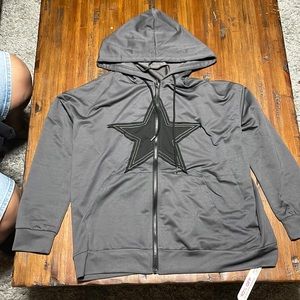 NWT gray zip up hoodie jacket with a black star. Thin material. Not lined.